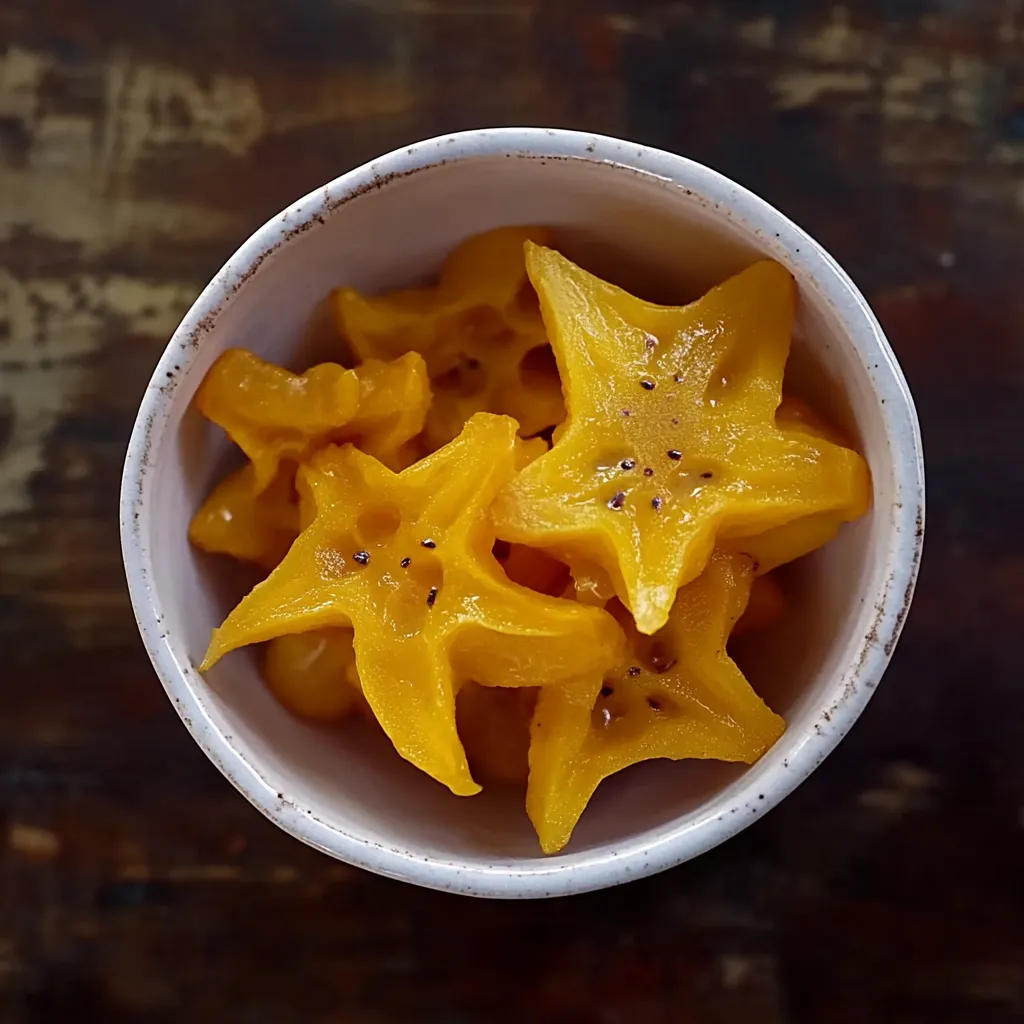 Um copo cheio de estrelas de laranja.